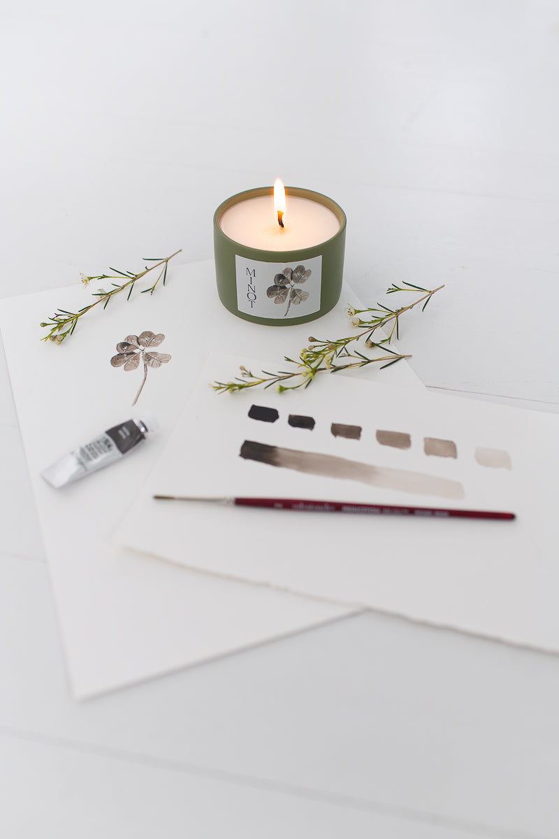 Lucky Charm features a sepia watercolor shamrock by Finding Silver Pennies' Danielle Driscoll