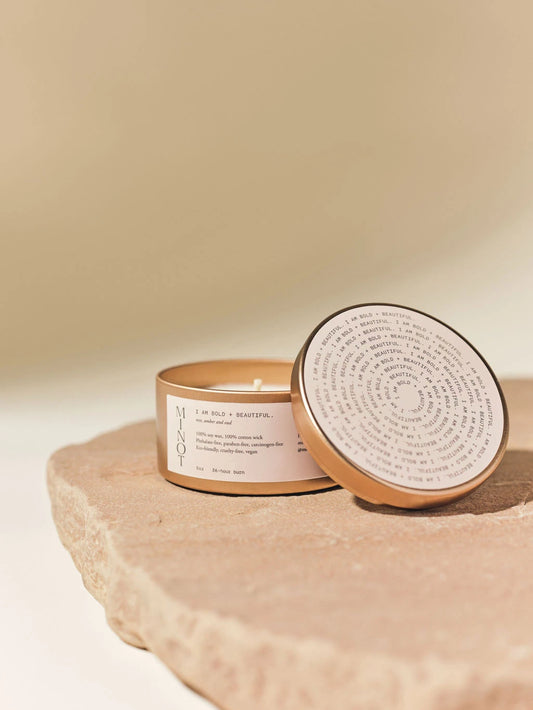 I Am Bold + Beautiful Candle is a rose candle with clean-burning soy wax in a luxe gold tin