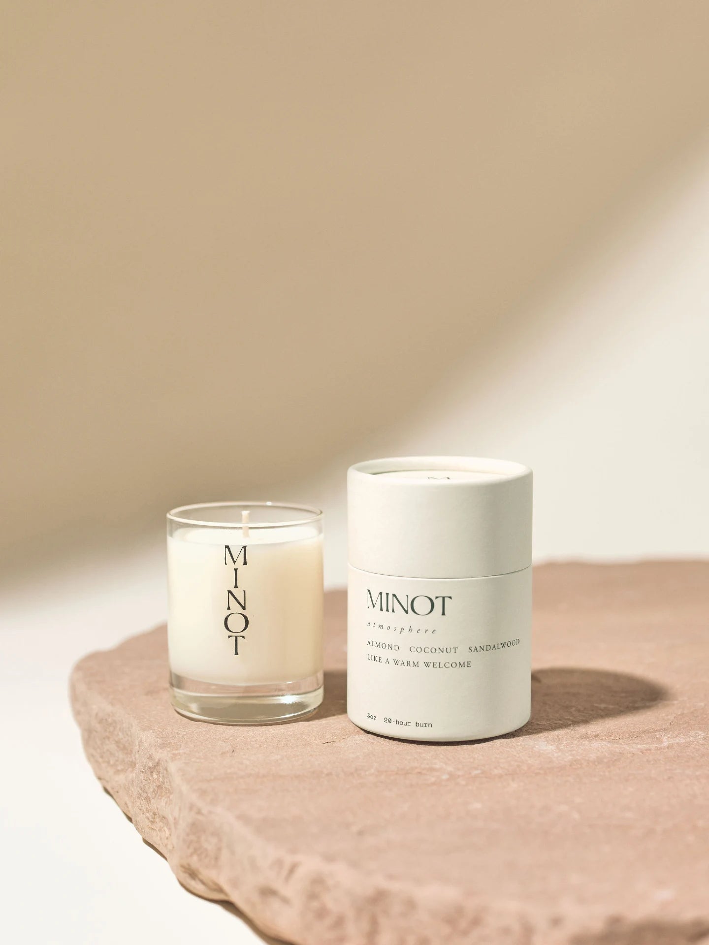 The hormone-friendly Atmosphere Mini is a small, clean-burning candle with a soothing almond scent
