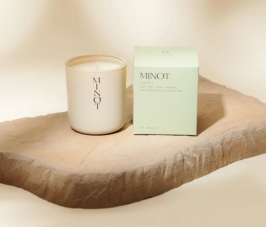 The Summit candle is made of soy wax and offers evergreen scents of sage, pine, cedar, and rosemary