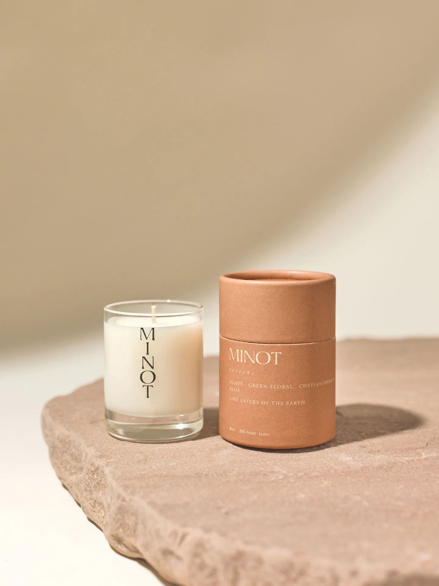 The Terrene Mini is an earthy, green travel candle with agave, green floral, chrysanthemum, and aloe