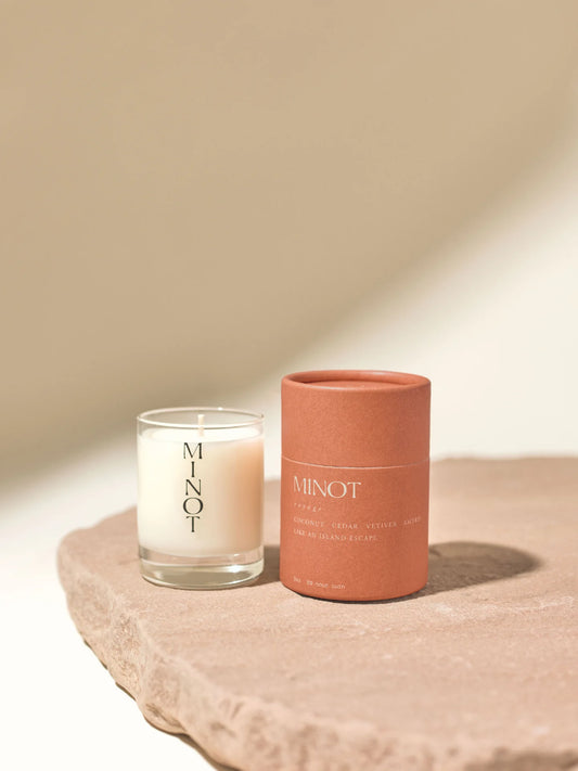 The Voyage Mini is a clean-burning, natural coconut travel candle with cedar, vetiver, and amyris